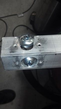 Back side of angle. Excuse the extra holes and the extra LONG cut. My original plan didn't work so I had to modify. If I were to make another set they would look much neater I promise :)