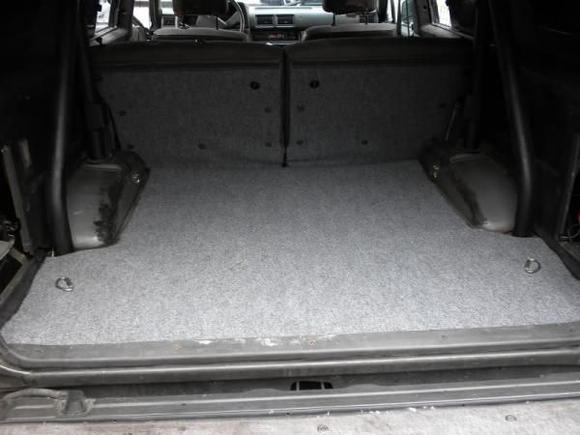 The rear carpet job i did on the bedding. Looks so much more better then the crap the last owner left it like.