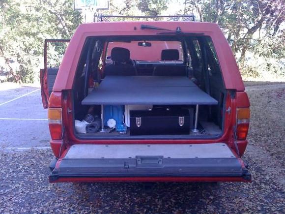 I bought one 4'x8' sheet of 3/4" plywood and cut it in two sections to fit the back. The supports are 10" sections of 3/4" pipe threaded into flanges.