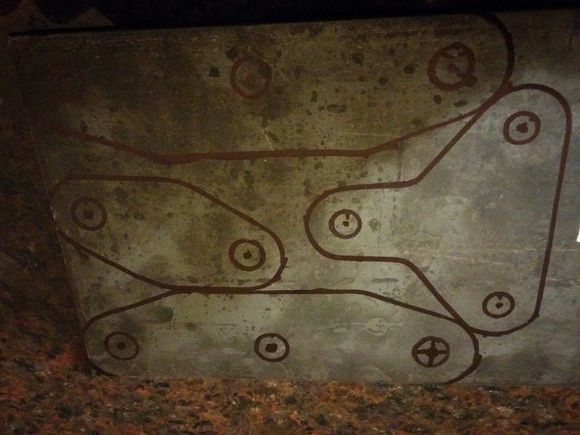 Gaskets traced onto 1/4 steel plate, ready to be cut.