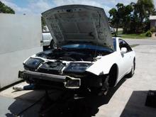 installing coilovers and changing rims, exhaust, and bumper