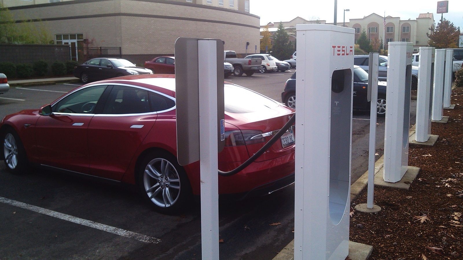 Tesla Supercharger Green Car Photos, News, Reviews, and Insights