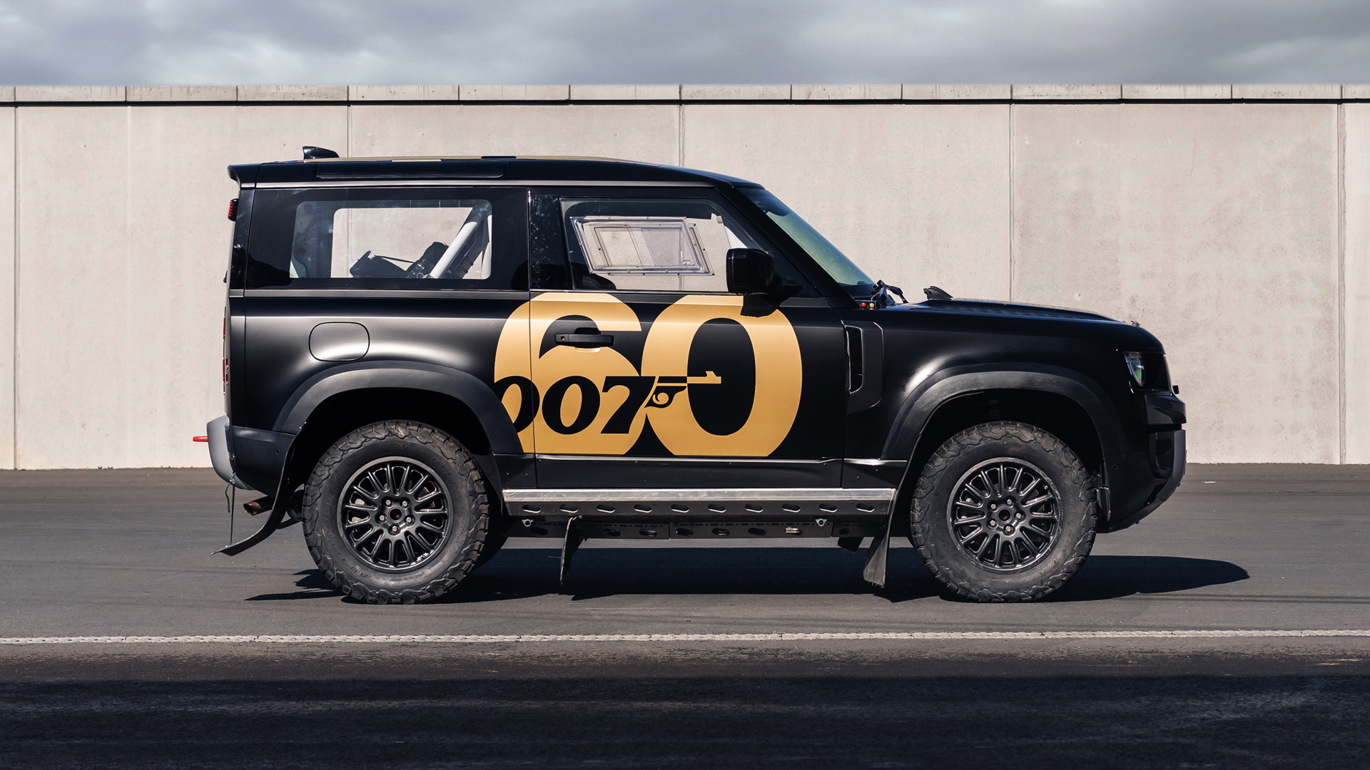 Land Rover Defender 90 with 60 years of James Bond livery