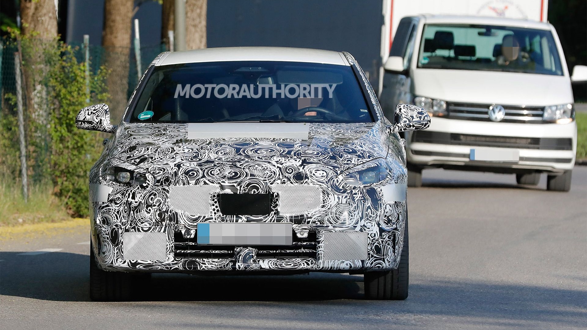 2023 BMW M135i Hatchback facelift spy shots - Photo credit: S. Baldauf/SB-Medien