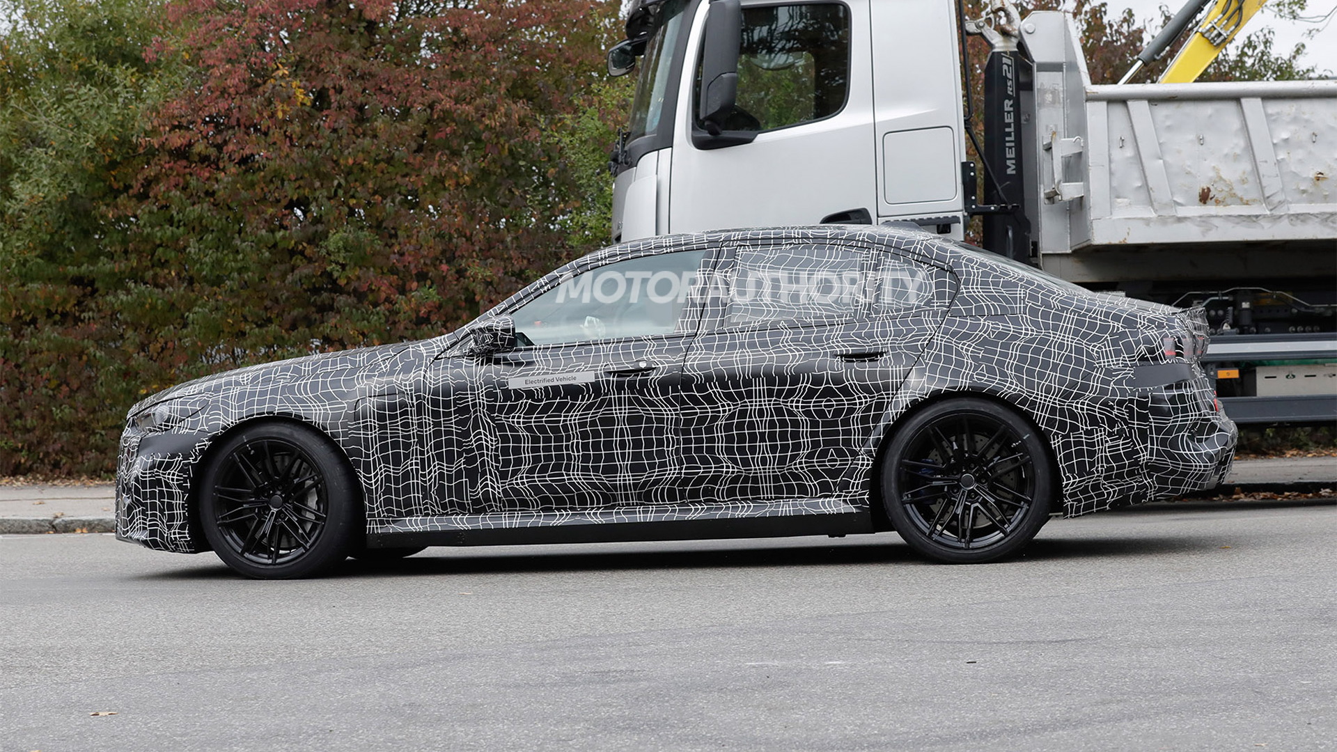 2025 BMW M5 spy shots and video: Hybrid power set for redesigned super sedan