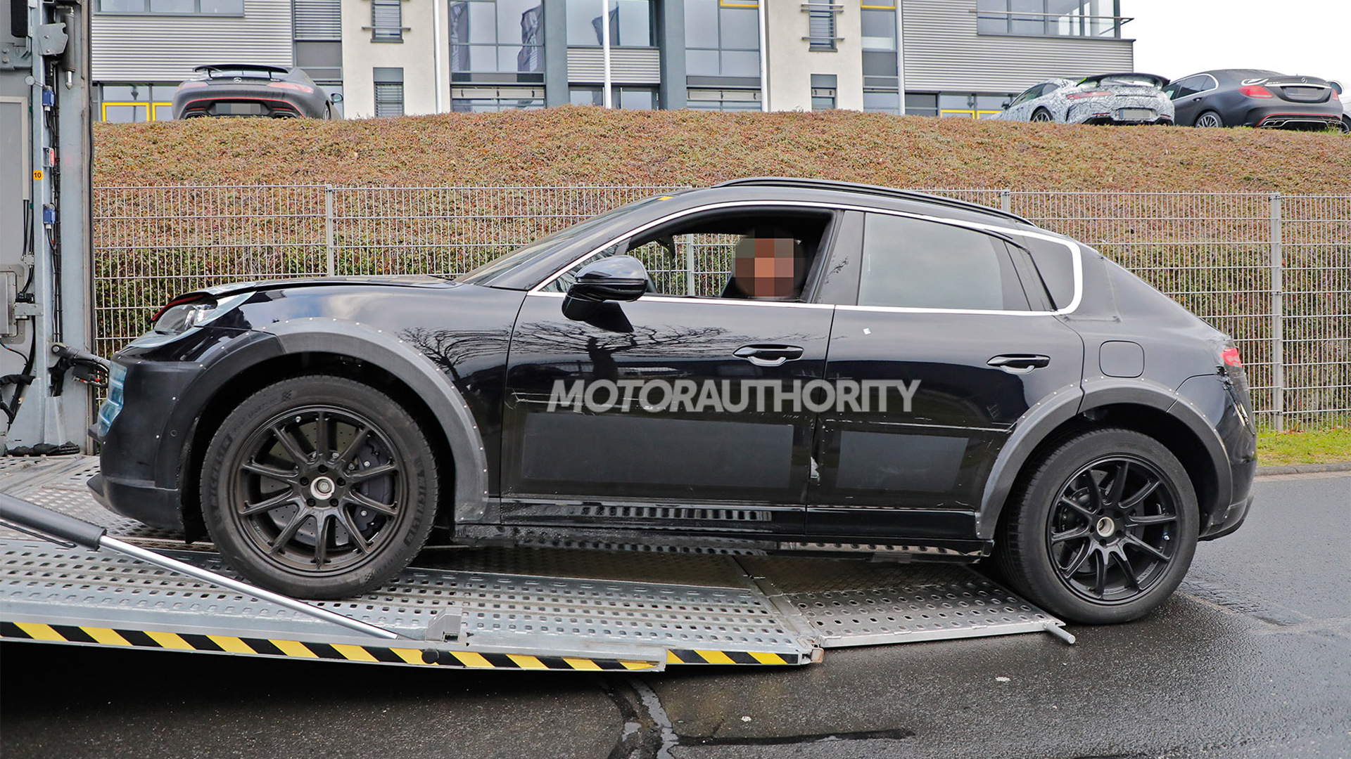 2027 Porsche Cayenne EV test mule spy shots - Photo credit: Baldauf