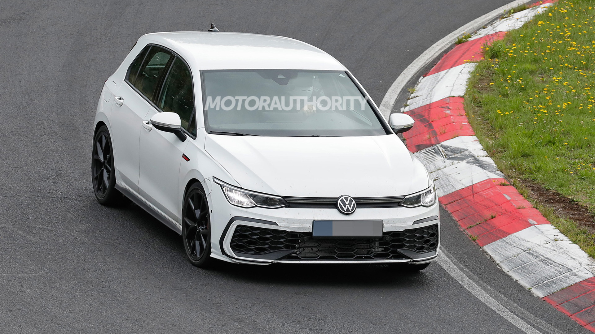 2025 Volkswagen Golf GTI facelift spy shots - Photo credit: Baldauf