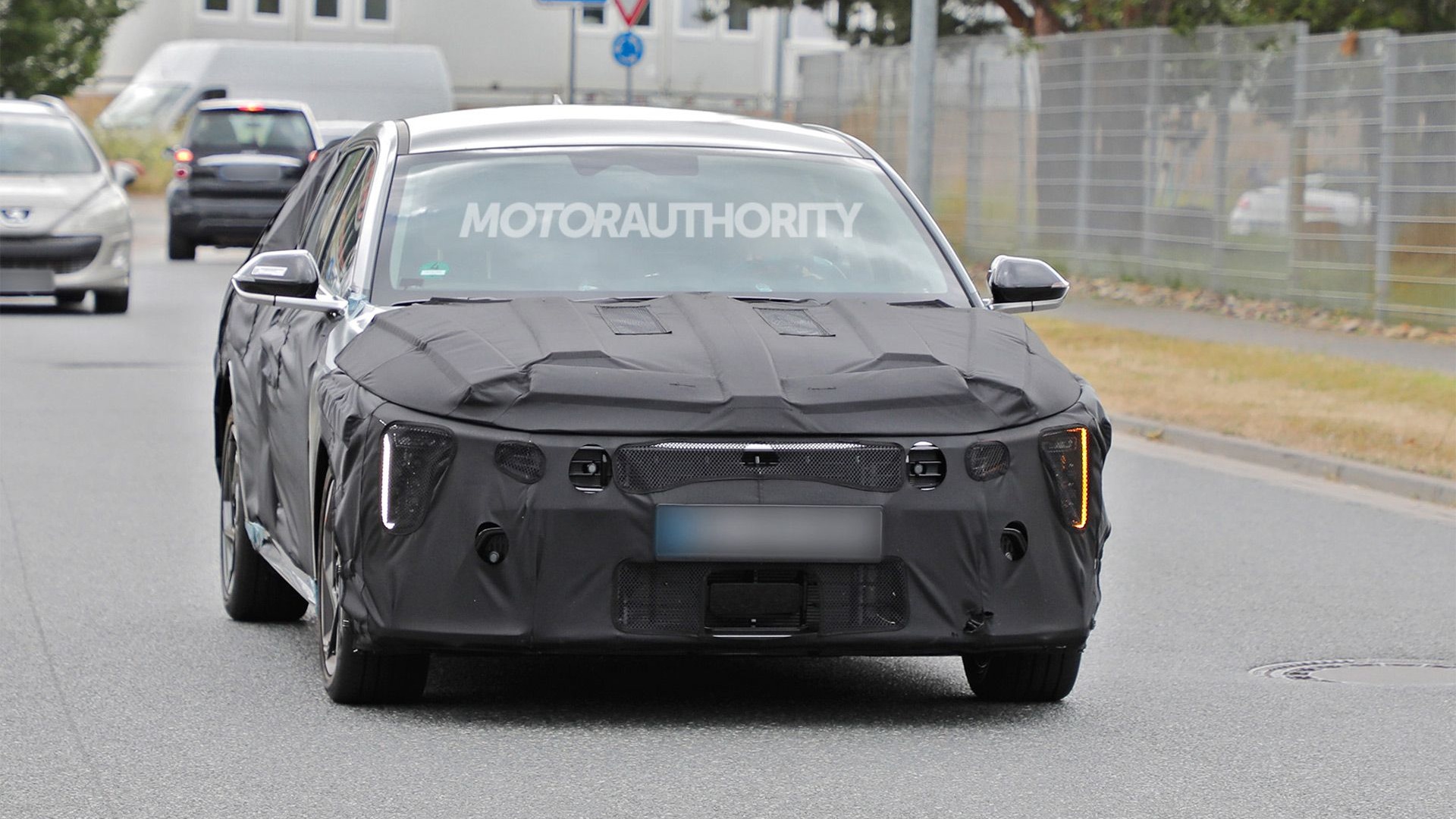 2026 Kia K4 hatchback spy shots - Photo via Baldauf