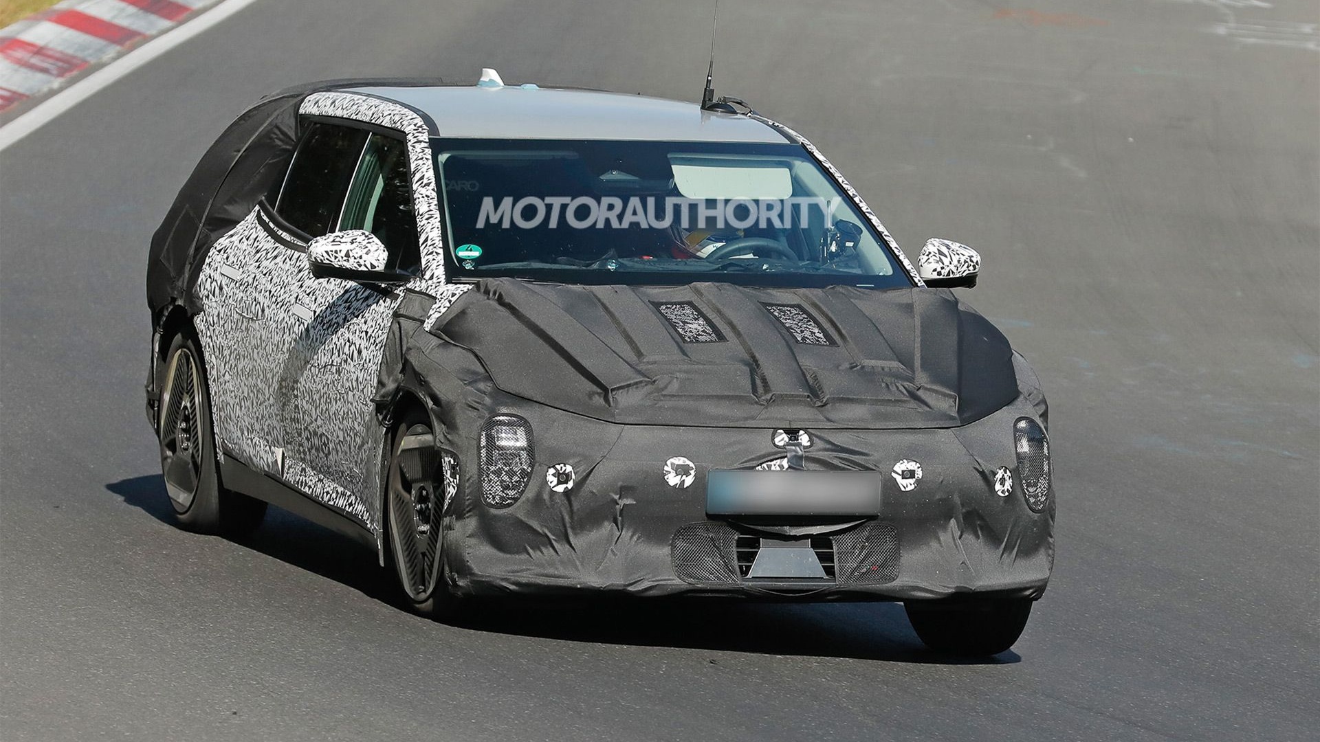 2026 Kia EV4 hatchback spy shots - Photo via Baldauf