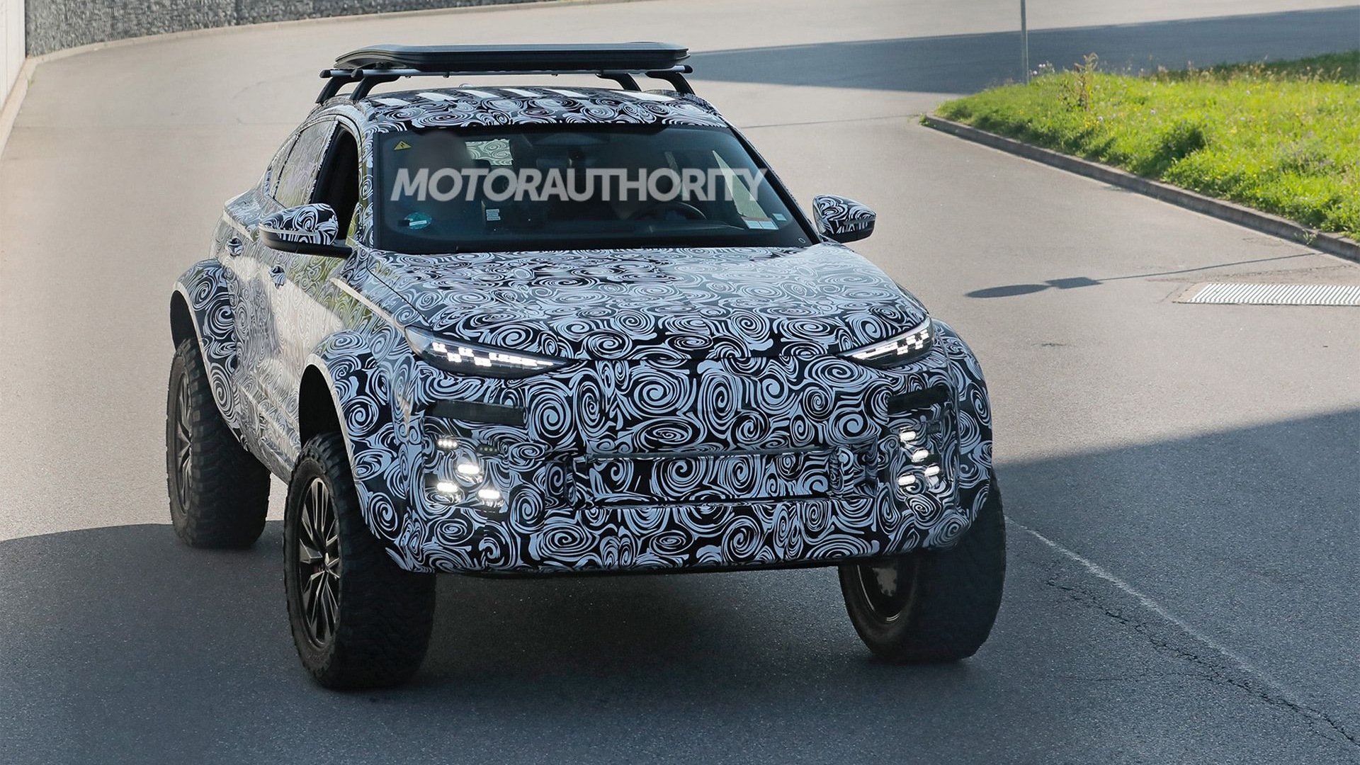 Audi Q6 Sportback E-Tron off-roader spy shots - Photo via Baldauf