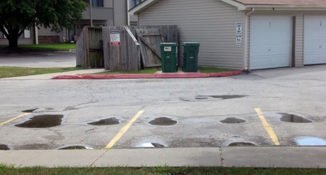 Pot Holes Parked Cars Set In